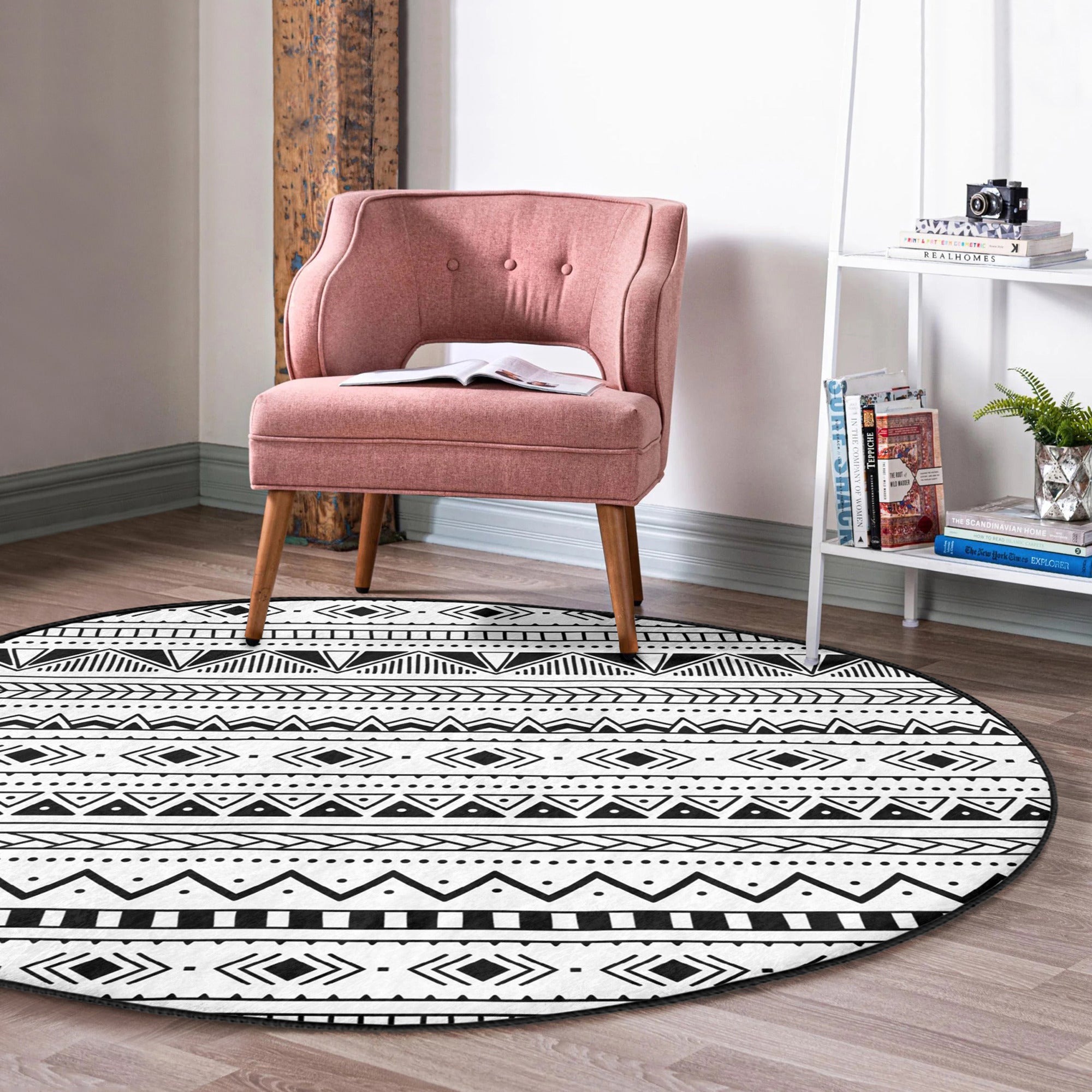 Native Round Rug in black and white, showcasing its soft velvet texture and round shape, perfect for home decor.