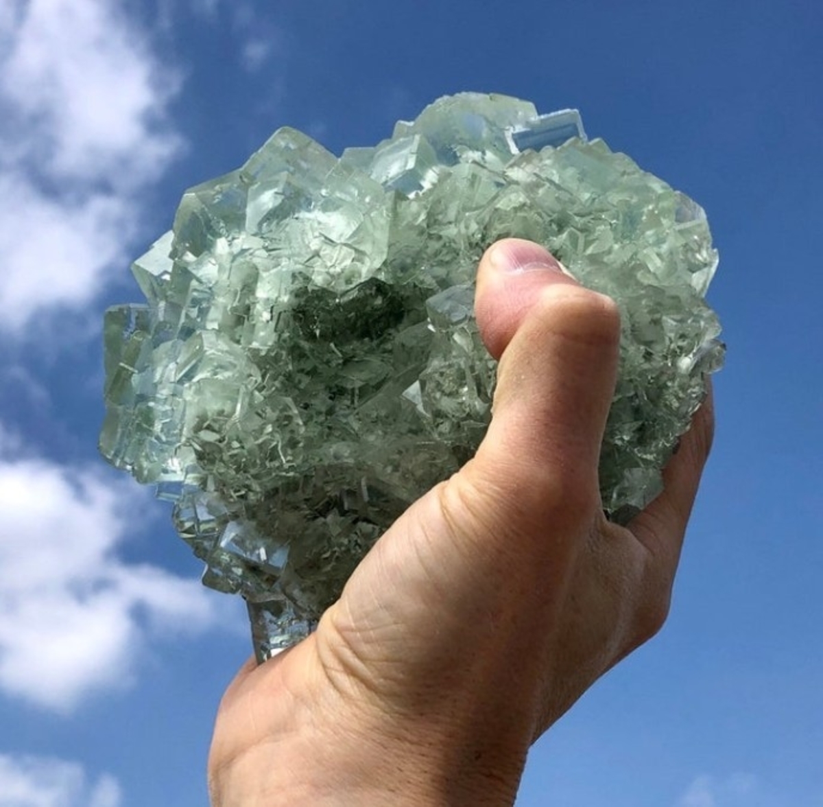 Natural Raw Green Fluorite Crystal weighing 5 lbs, showcasing its unique cubic and octahedral formations in vibrant green hues.