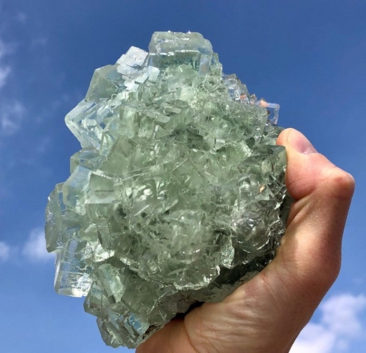 Natural Raw Green Fluorite Crystal weighing 5 lbs, showcasing its unique cubic and octahedral formations in vibrant green hues.