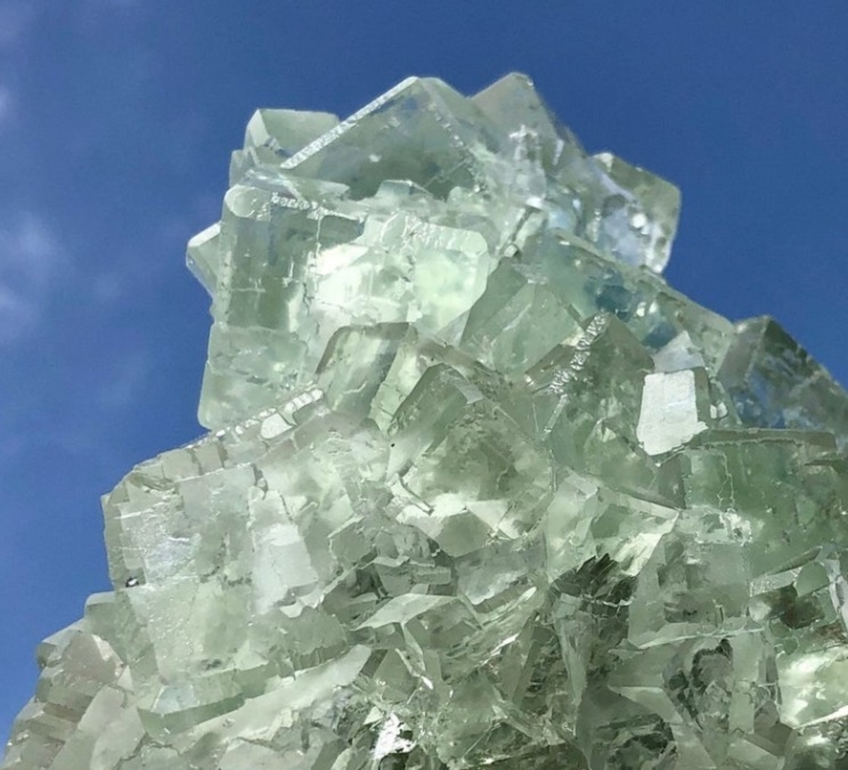 Natural Raw Green Fluorite Crystal weighing 5 lbs, showcasing its unique cubic and octahedral formations in vibrant green hues.