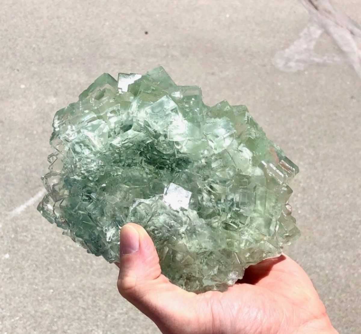 Natural Raw Green Fluorite Crystal weighing 5 lbs, showcasing its unique cubic and octahedral formations in vibrant green hues.