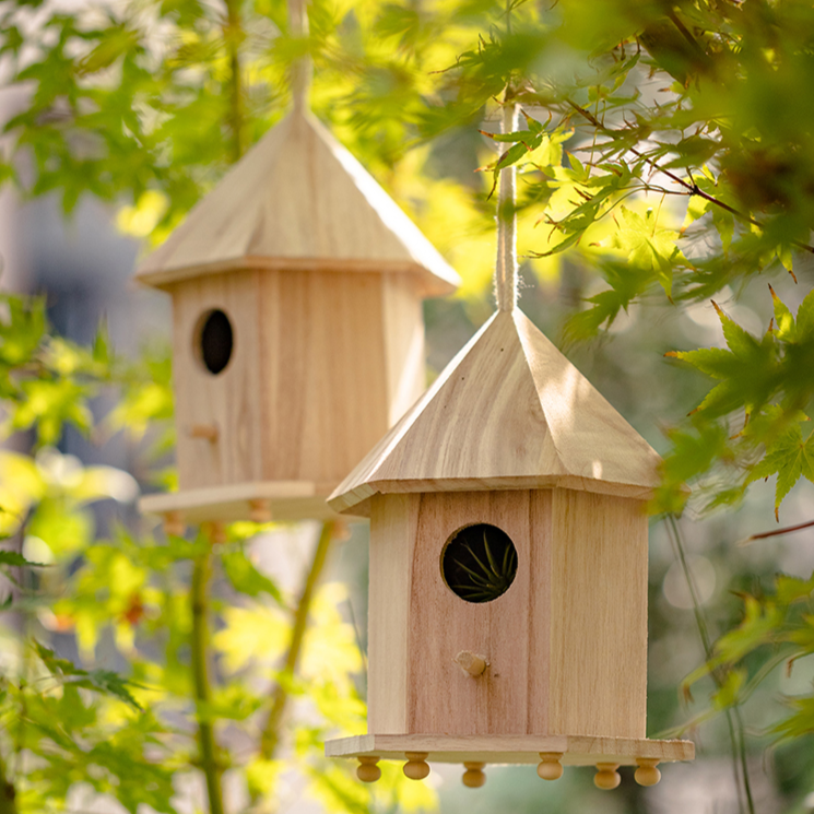 Natural Solid Wood Bird's Nest made from Paulownia wood with hemp rope, showcasing rustic charm and eco-friendly design.