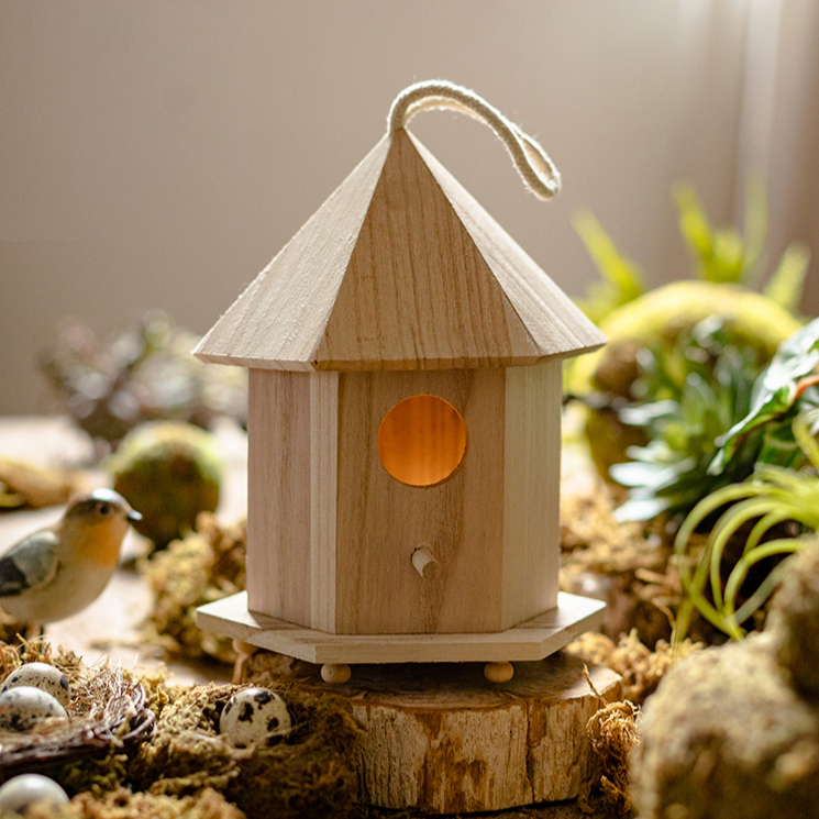 Natural Solid Wood Bird's Nest made from Paulownia wood with hemp rope, showcasing rustic charm and eco-friendly design.