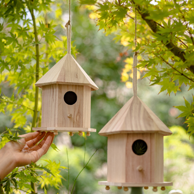 Natural Solid Wood Bird's Nest made from Paulownia wood with hemp rope, showcasing rustic charm and eco-friendly design.