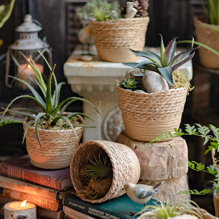 Natural Straw Desktop Flower Basket in khaki/brown color, showcasing its round shape and woven texture, ideal for flowers or desk organization.