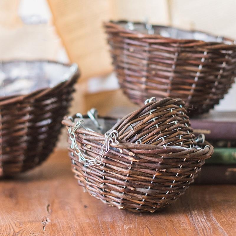 Set of 4 Natural Willow Hanging Planters with metal chains, showcasing various sizes and natural brown colors, ideal for indoor and outdoor decor.