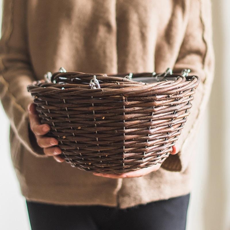 Set of 4 Natural Willow Hanging Planters with metal chains, showcasing various sizes and natural brown colors, ideal for indoor and outdoor decor.