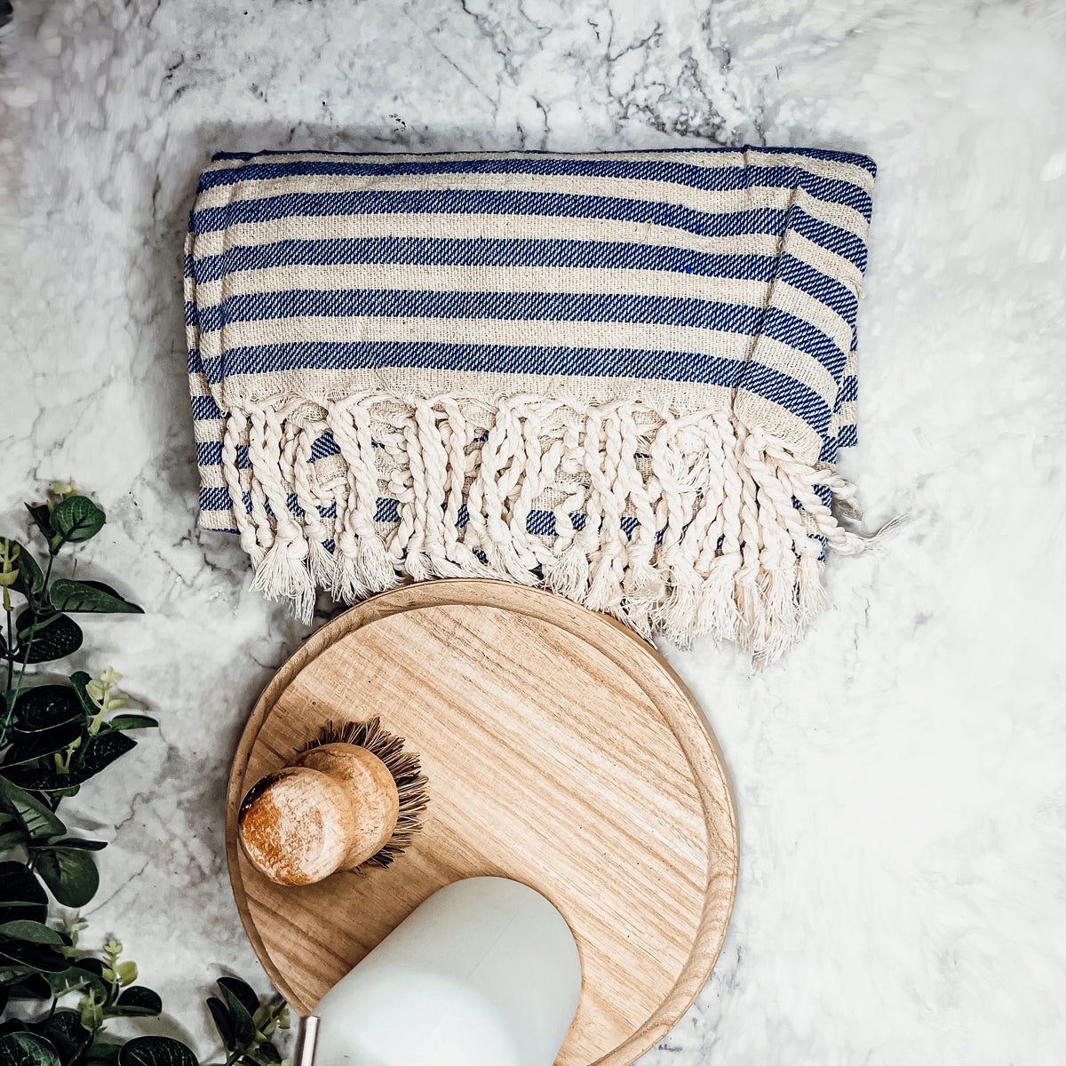 Nautical Towel 180GSM made from 100% Turkish cotton, featuring blue and grey stripes with decorative tassels.