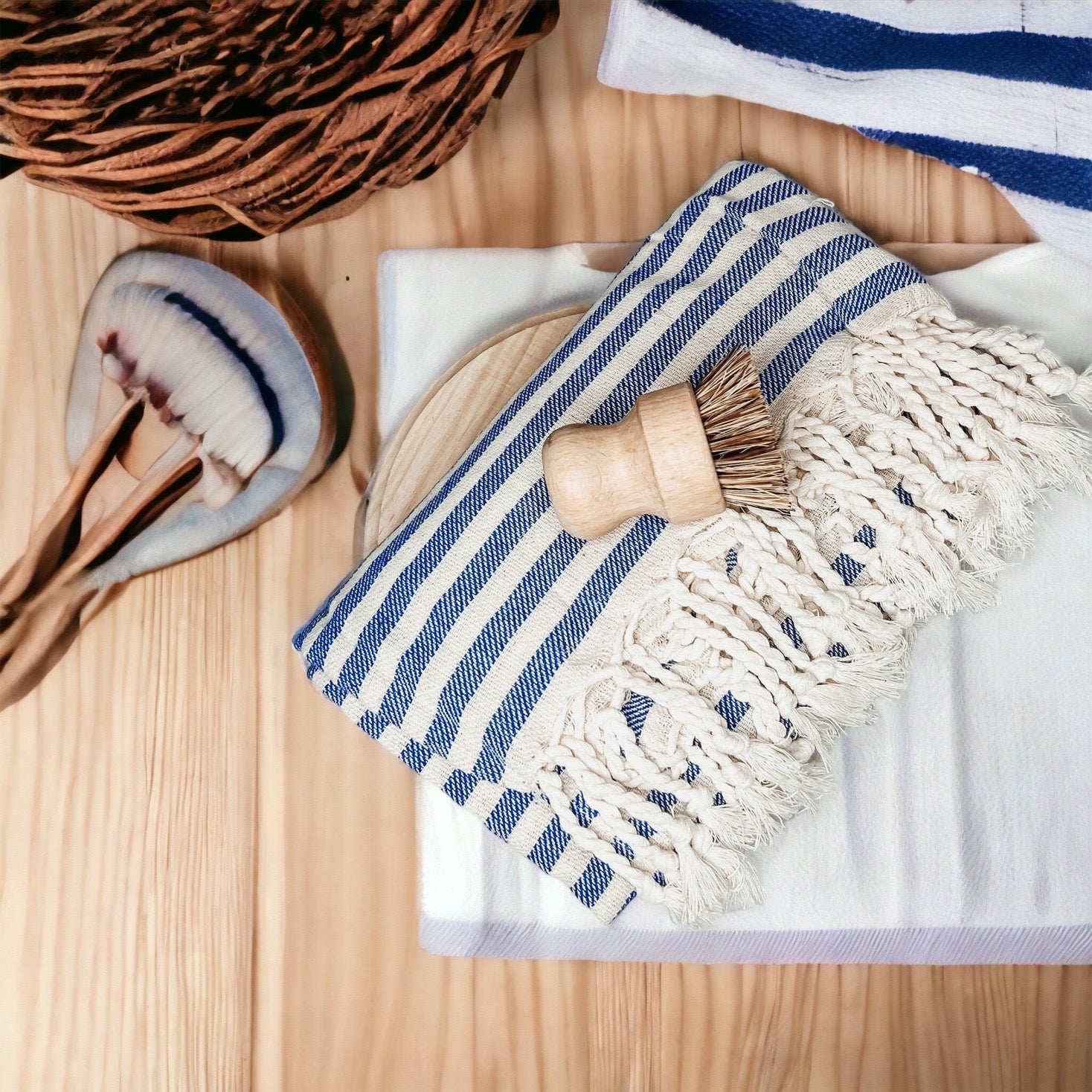 Nautical Towel 180GSM made from 100% Turkish cotton, featuring blue and grey stripes with decorative tassels.