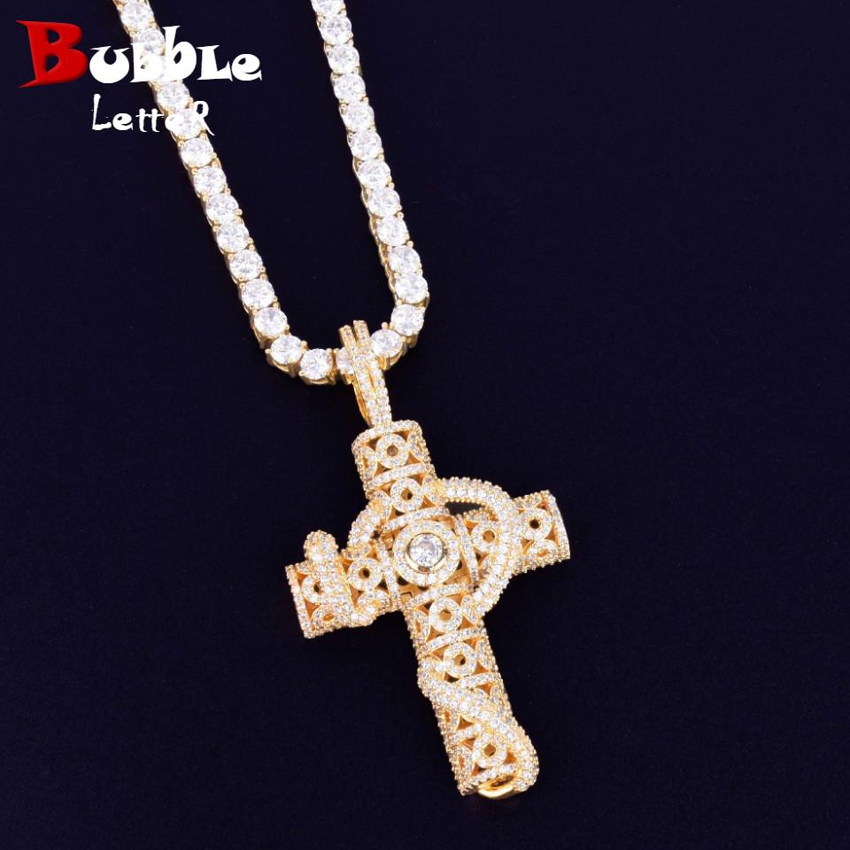 Gold color snake cross necklace with cubic zirconia charm, showcasing a unique and stylish design suitable for all occasions.