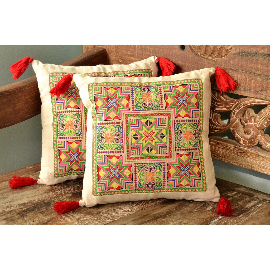 Colorful Needlepoint Tassel Pillow Cover handcrafted by Hmong artisans, featuring intricate embroidery and a vibrant design.