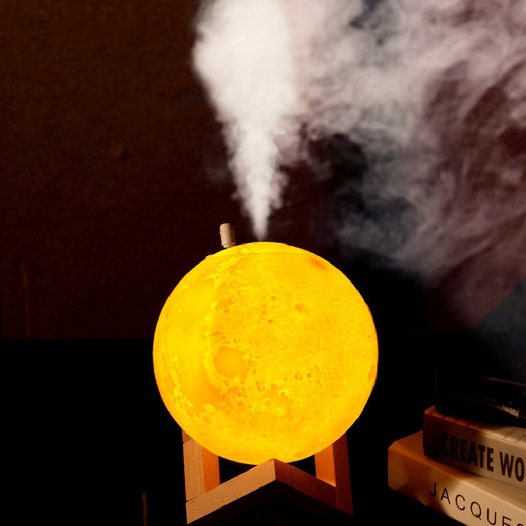 880ML Air Humidifier featuring a 3D moon lamp design, emitting a soft glow while diffusing essential oils.