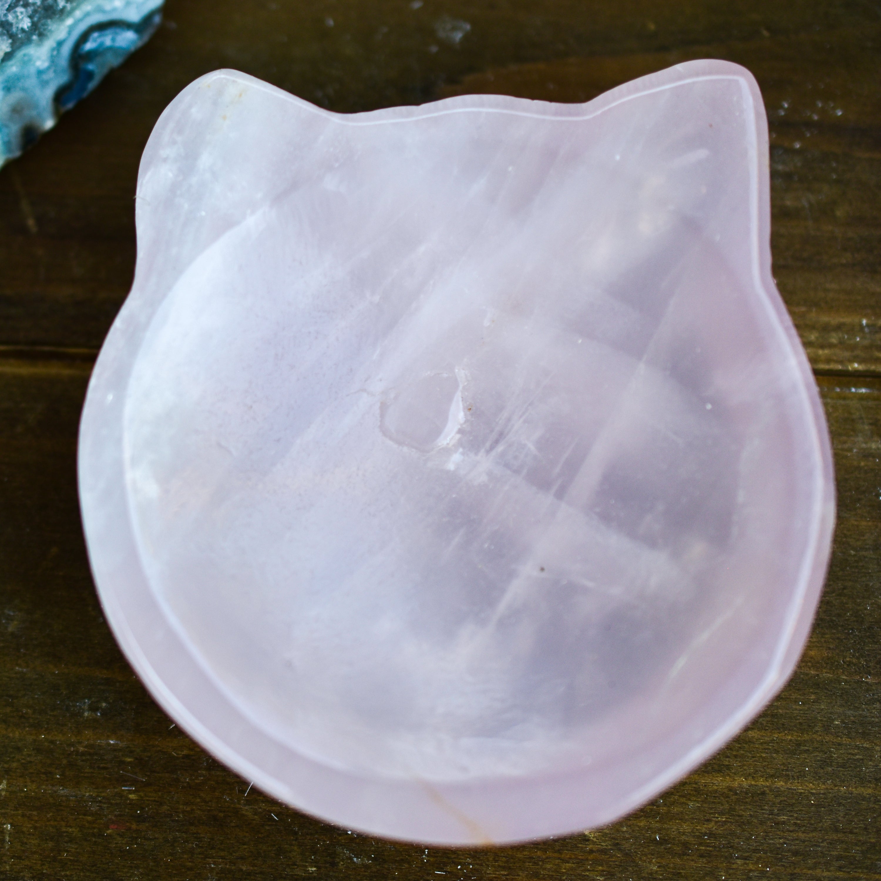 A collection of NEW Crystal Shape Bowls in unique designs including moons, hearts, and cat heads made from Rose Quartz and Quartz.