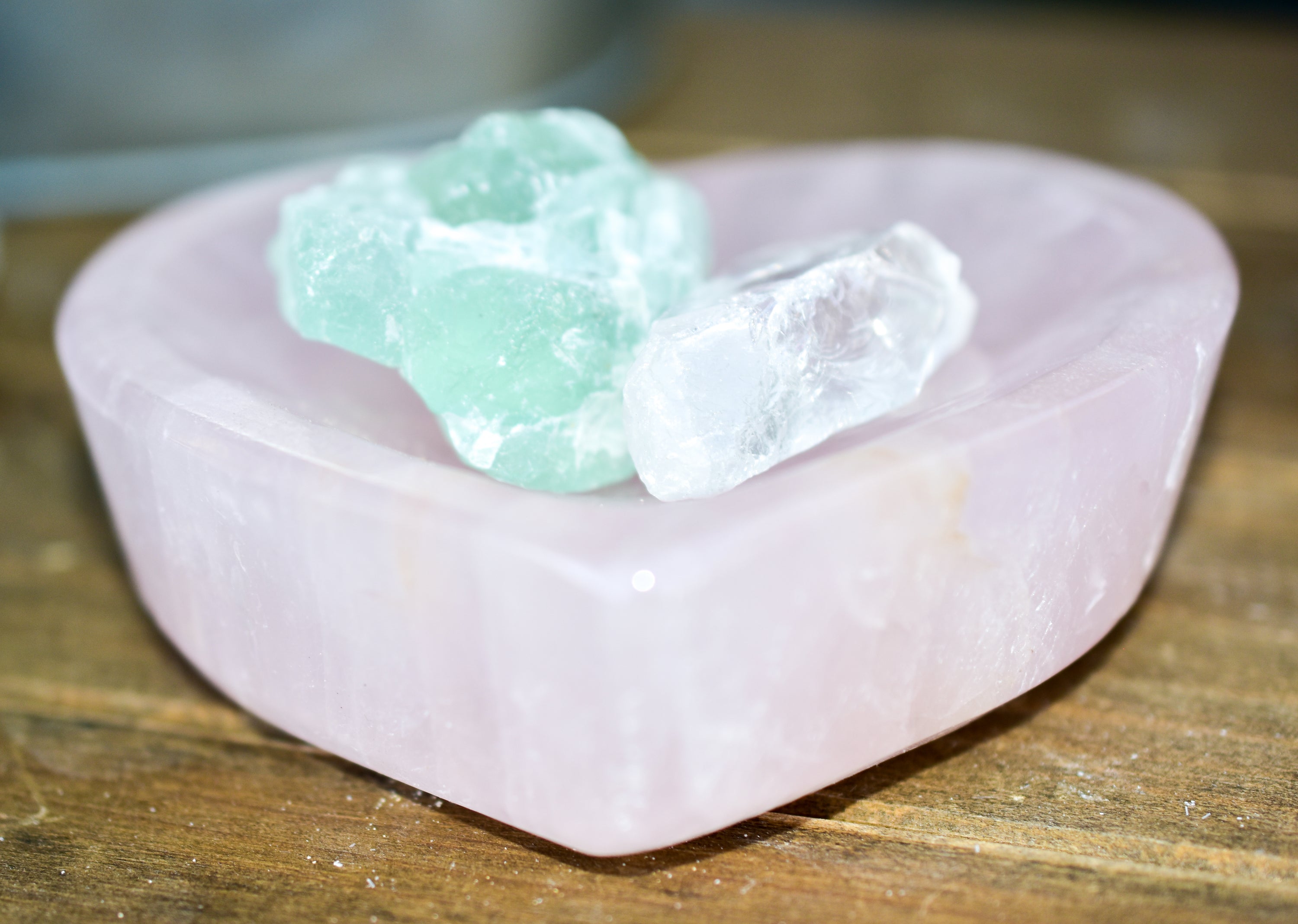 A collection of NEW Crystal Shape Bowls in unique designs including moons, hearts, and cat heads made from Rose Quartz and Quartz.