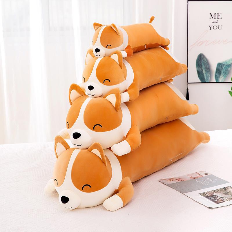 A collection of colorful Kawaii Corgi Dog plush toys in various sizes, showcasing their soft texture and adorable design.