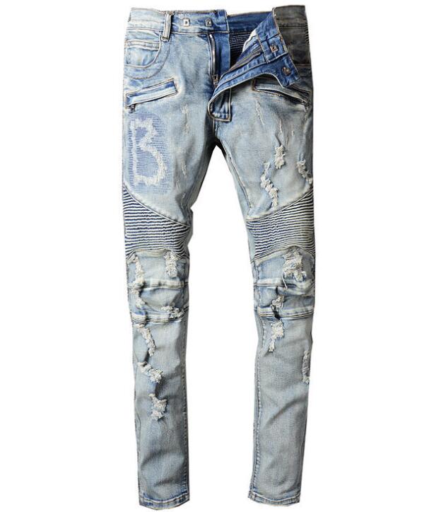 Men's distressed ripped skinny jeans in a fashionable design, showcasing a trendy look suitable for casual wear.