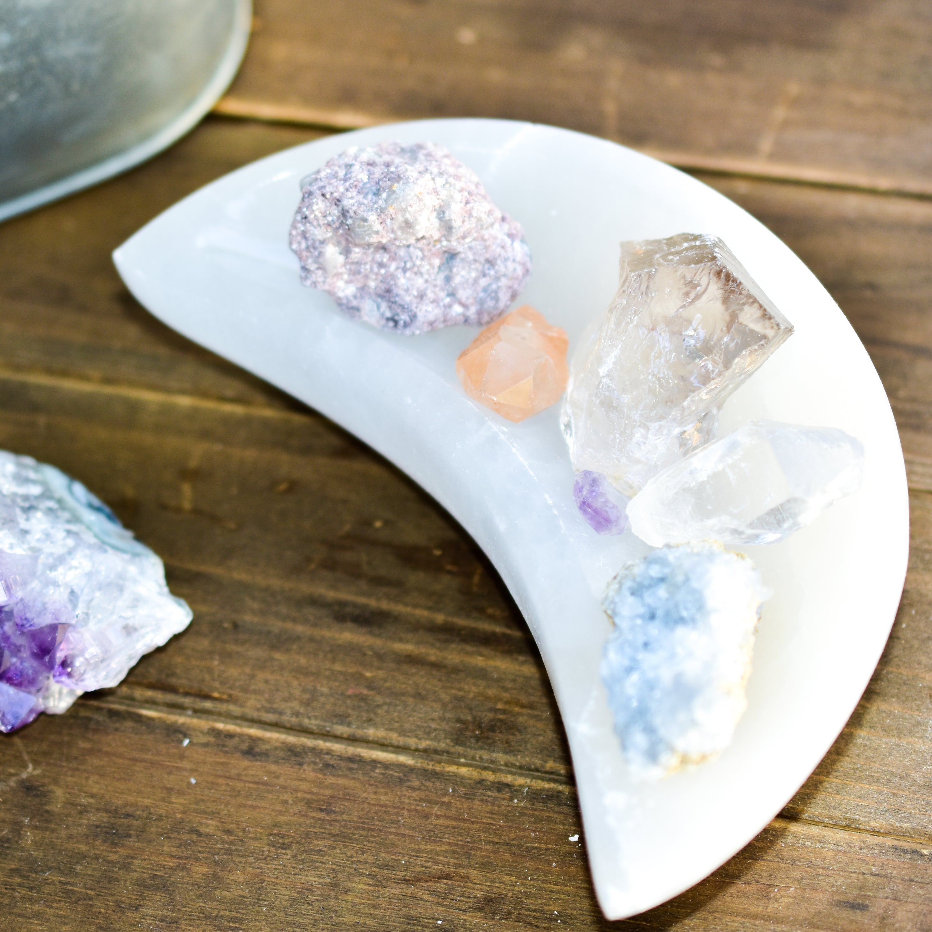 Handmade Selenite Moon Bowl from Morocco, perfect for holding crystals and jewelry.