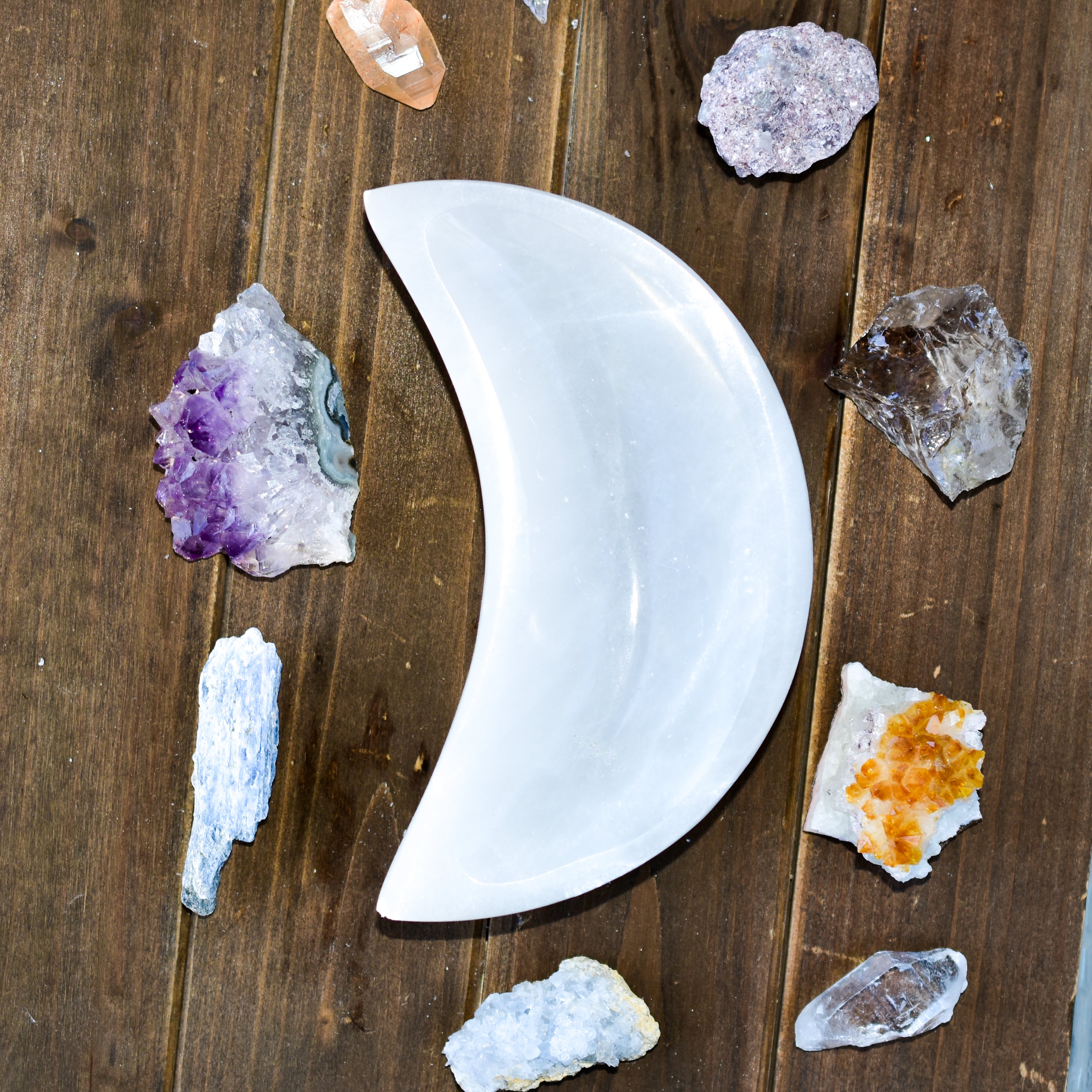 Handmade Selenite Moon Bowl from Morocco, perfect for holding crystals and jewelry.