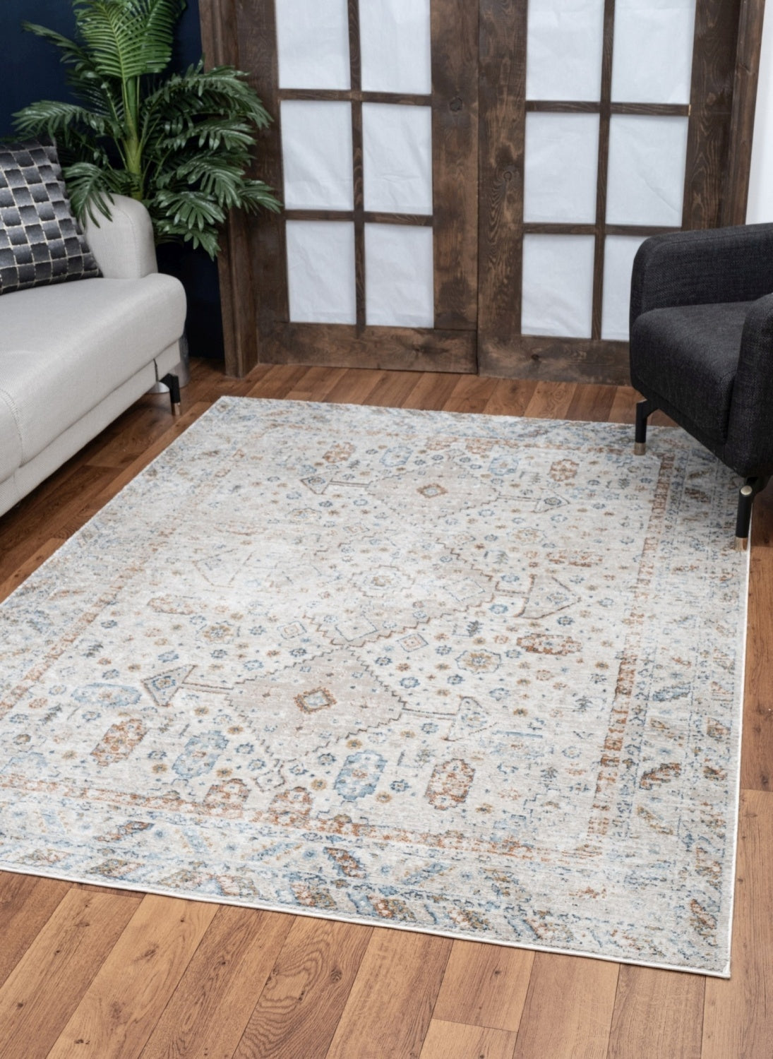 Noble Ivory Area Rug measuring 5 ft. 3 in. x 7 ft. 3 in., featuring a beige color and elegant medallion patterns, perfect for home decor.