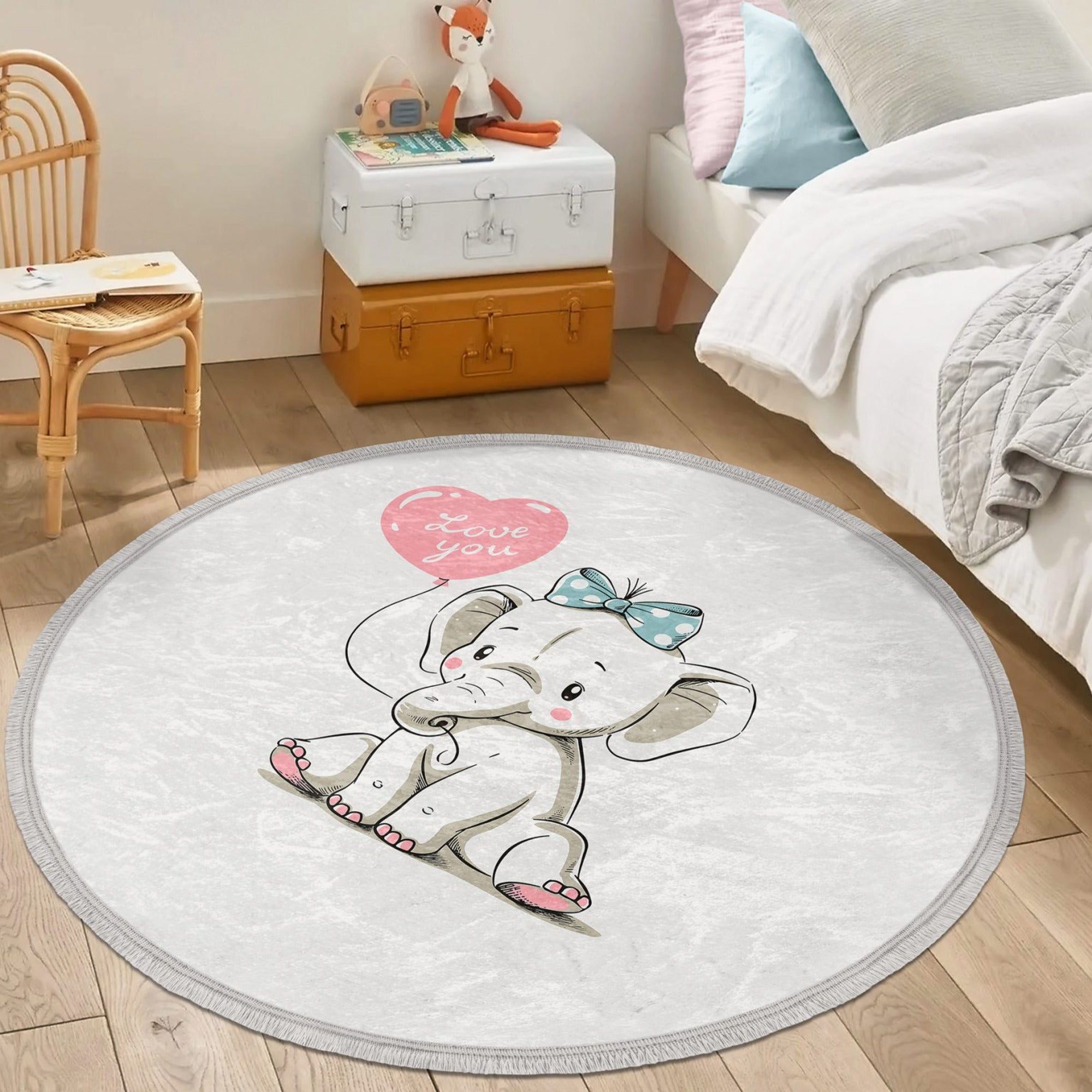 Nursery Elephant Patterned Round Rug featuring cute elephant design, soft velvet fabric, and fringes, perfect for kids' rooms.