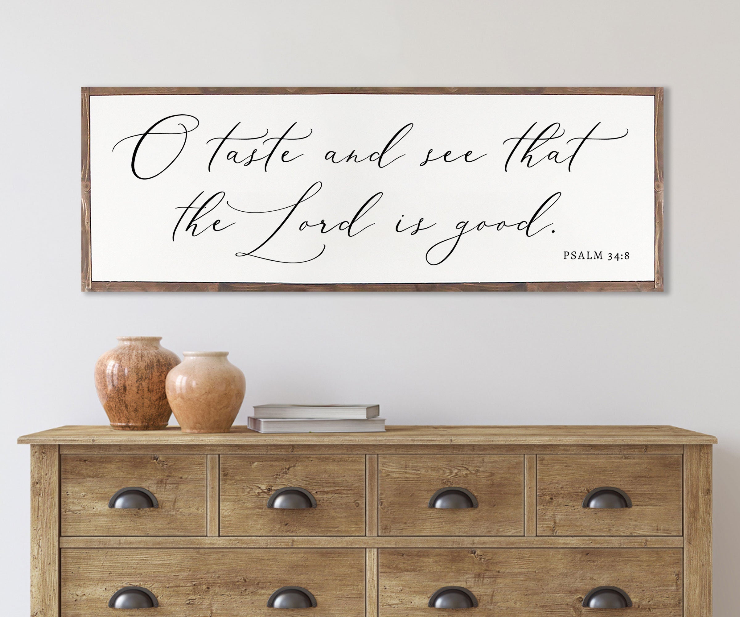 Rustic farmhouse wood sign featuring the scripture 'O Taste and See that The Lord is Good' from Psalm 35:8, framed and customizable.