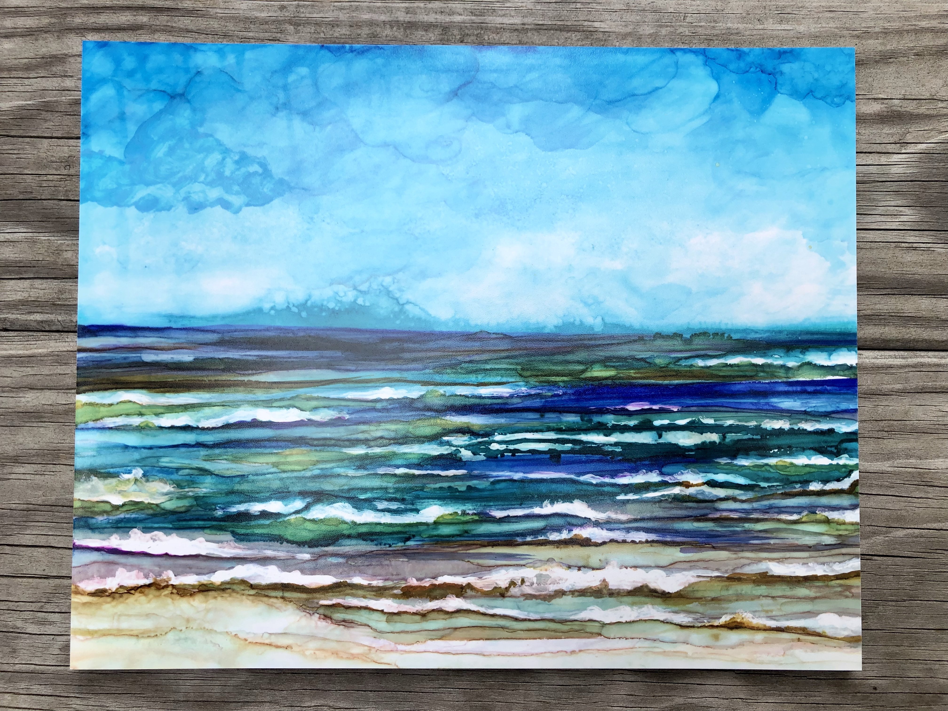 A vibrant ocean-scape print showcasing soothing blue waves and a serene sky, perfect for home decor.