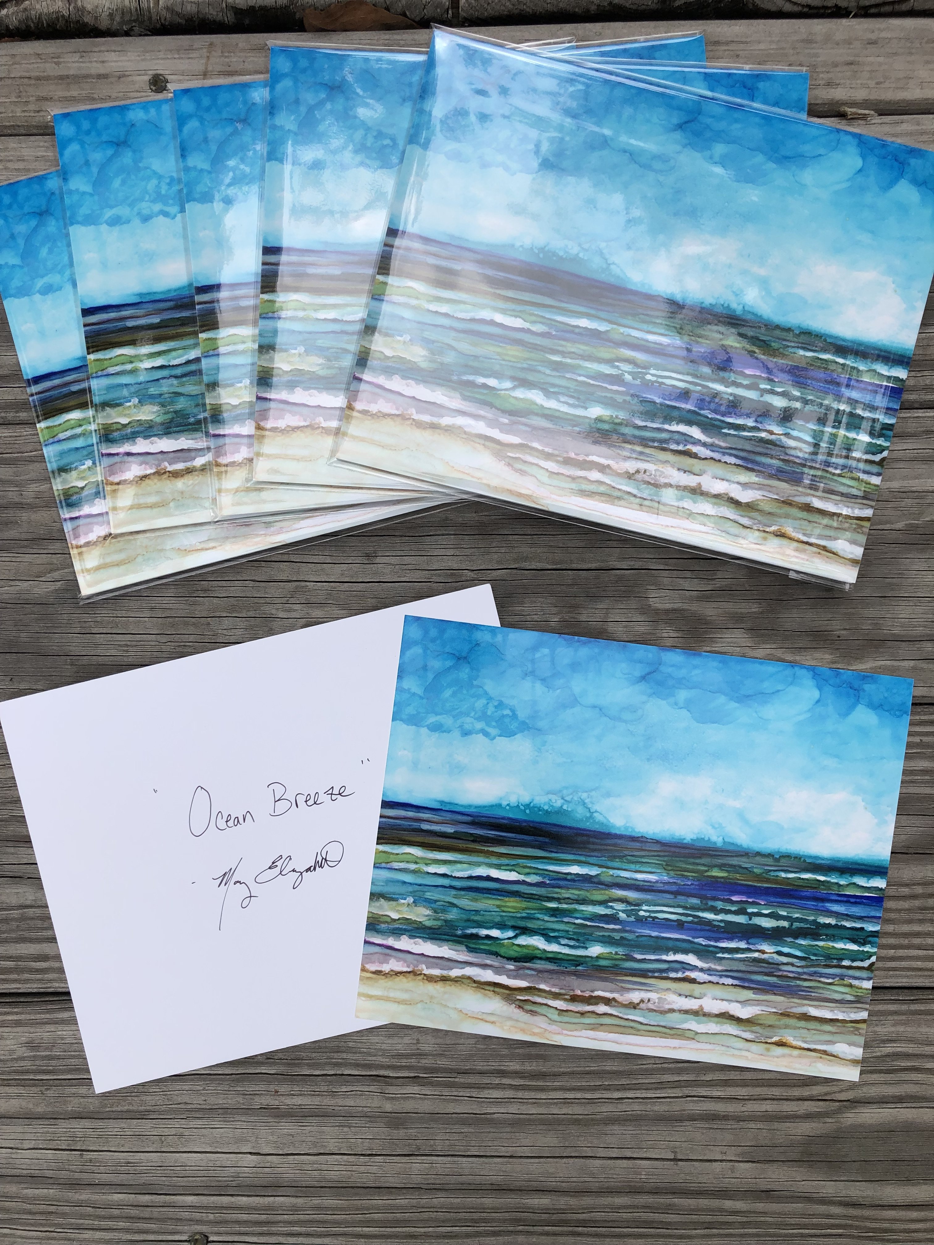 A vibrant ocean-scape print showcasing soothing blue waves and a serene sky, perfect for home decor.