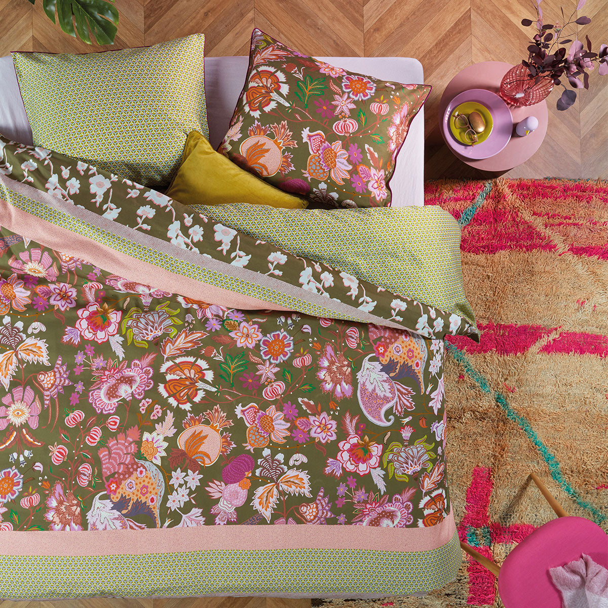 Oilily Amelie Sits Mix Green Cotton Sateen Quilt Cover Set featuring vibrant floral designs and pastel colors, perfect for a stylish bedroom.