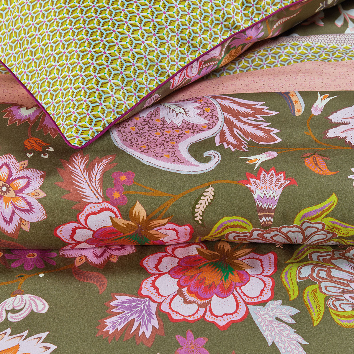 Oilily Amelie Sits Mix Green Cotton Sateen Quilt Cover Set featuring vibrant floral designs and pastel colors, perfect for a stylish bedroom.