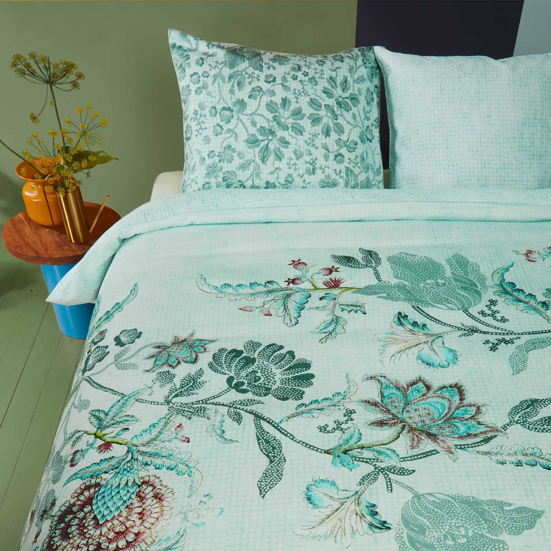 Oilily City Sits Green Quilt Cover Set featuring hand-painted floral design on cotton sateen fabric, perfect for modern bedrooms.