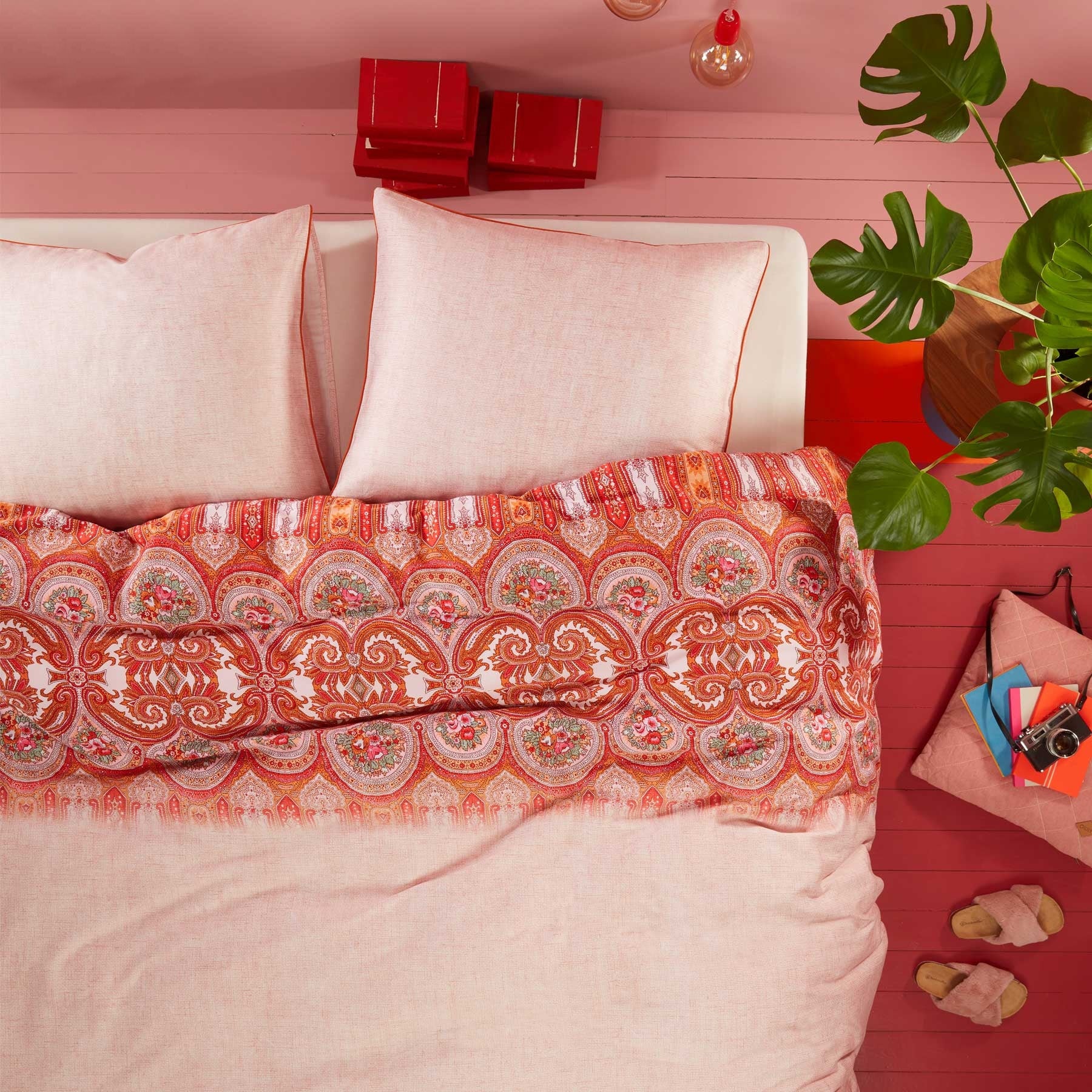 Oilily Paisley Pink Quilt Cover Set King featuring vibrant paisley patterns in pink, red, orange, and green on soft cotton sateen fabric.