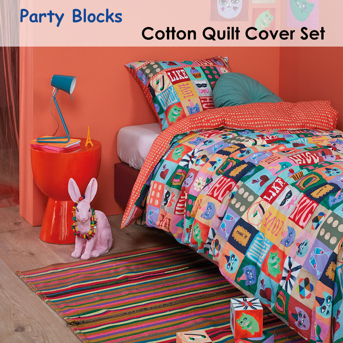 Oilily Party Blocks Cotton Quilt Cover Set Single featuring colorful block designs and bright orange dots on the reverse side.