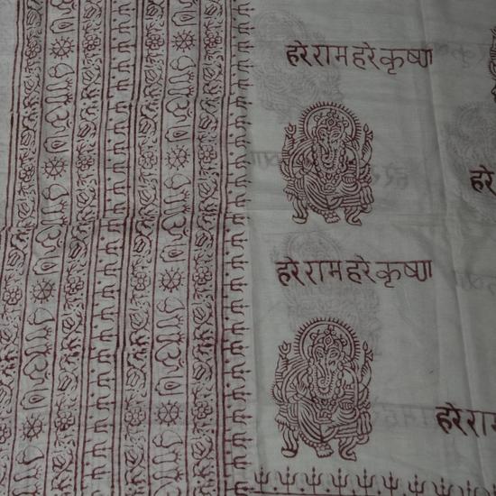 OM Bhakti Prayer Shawl featuring hand block printed OM symbols on soft rayon fabric, elegantly draped.