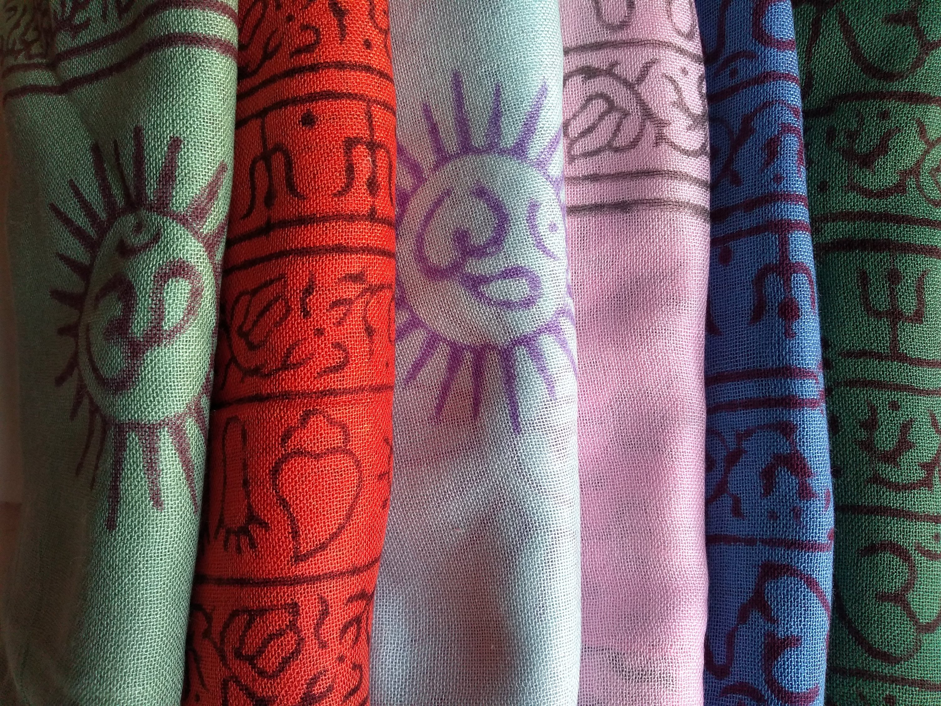 OM Bhakti Prayer Shawl featuring hand block printed OM symbols on soft rayon fabric, elegantly draped.