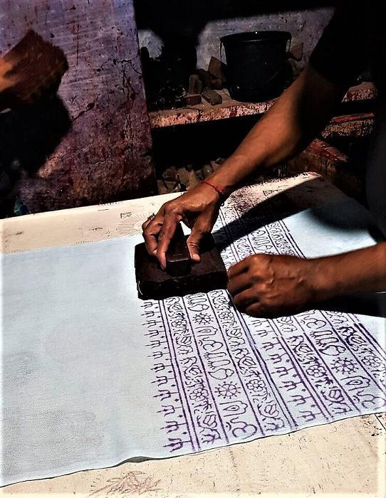 OM Bhakti Prayer Shawl featuring hand block printed OM symbols on soft rayon fabric, elegantly draped.