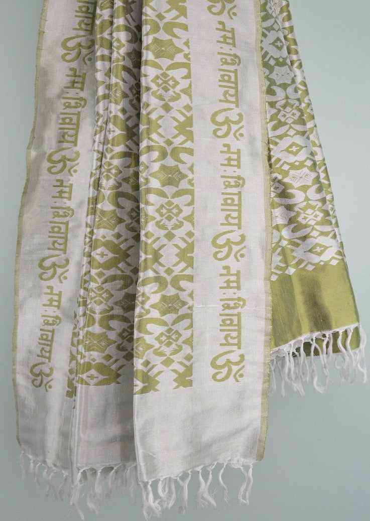 A beautifully handwoven silk shawl featuring the mantra 'OM Namah Shivay' with floral motifs in Copper, Yellow, and Pista Green colors.