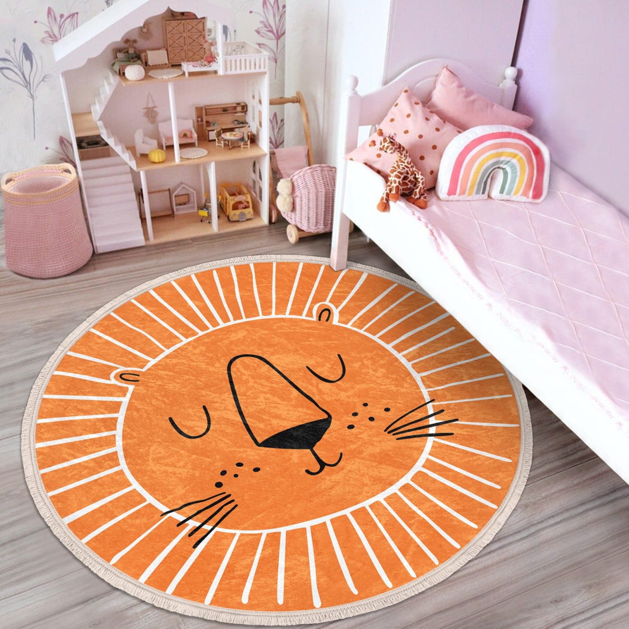 Orange round rug featuring a playful lion print, perfect for kids' rooms and nurseries.