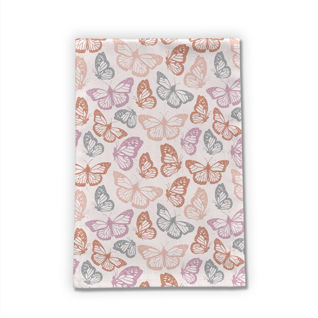 Orange and pink butterfly tea towel made of cotton twill, featuring a vibrant design and hemmed edges, perfect for kitchen use.