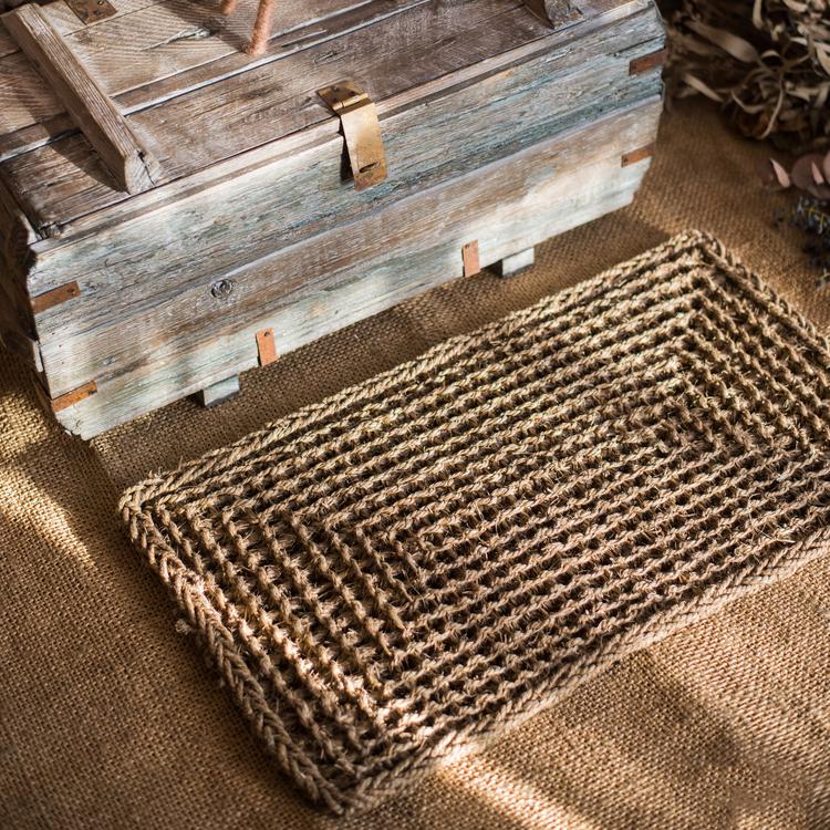 Organic Natural Straw Door Mat in khaki and brown colors, showcasing its rectangular and half round shapes.