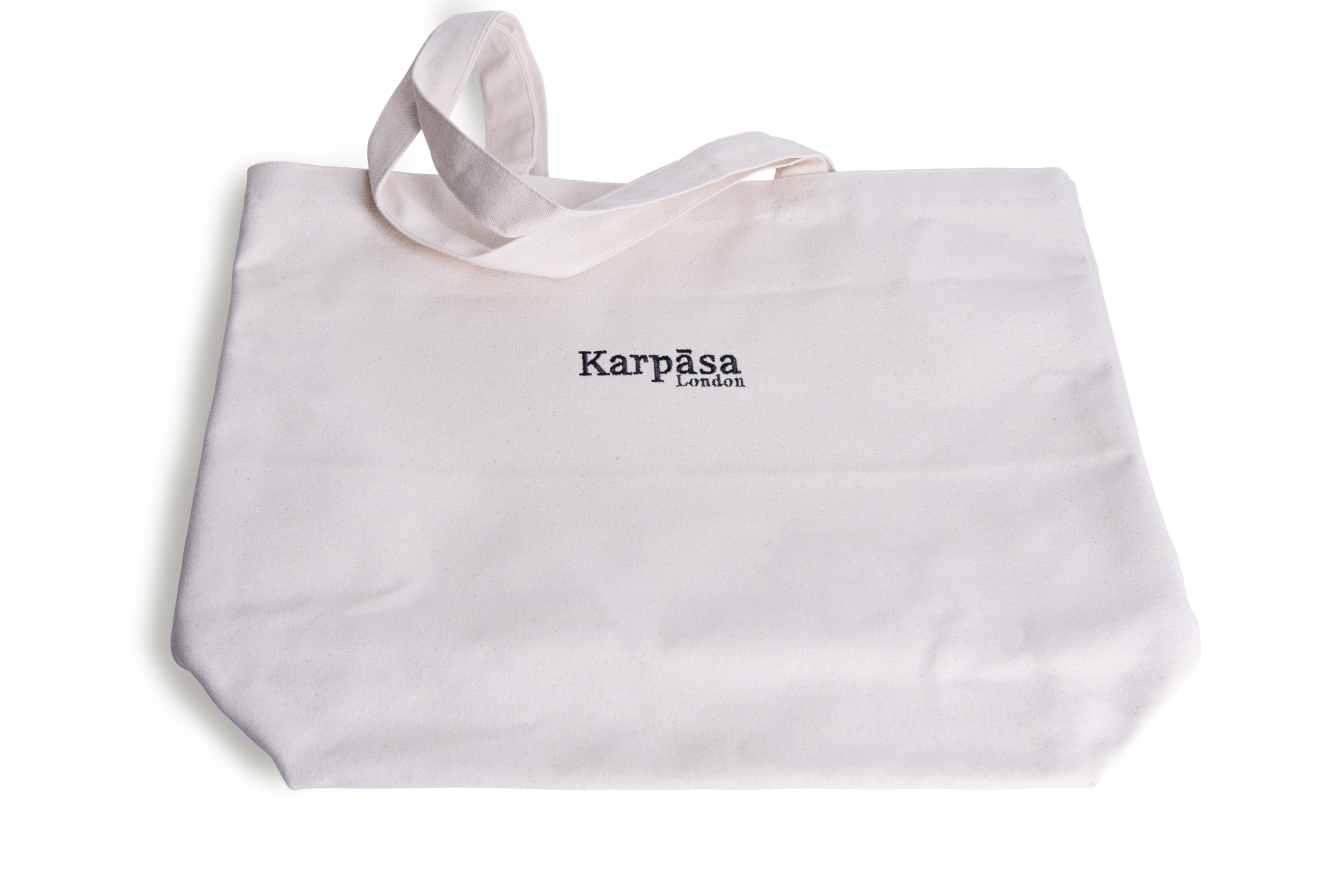 A natural organic cotton shopping bag with thick weave, perfect for eco-friendly shopping and daily errands.