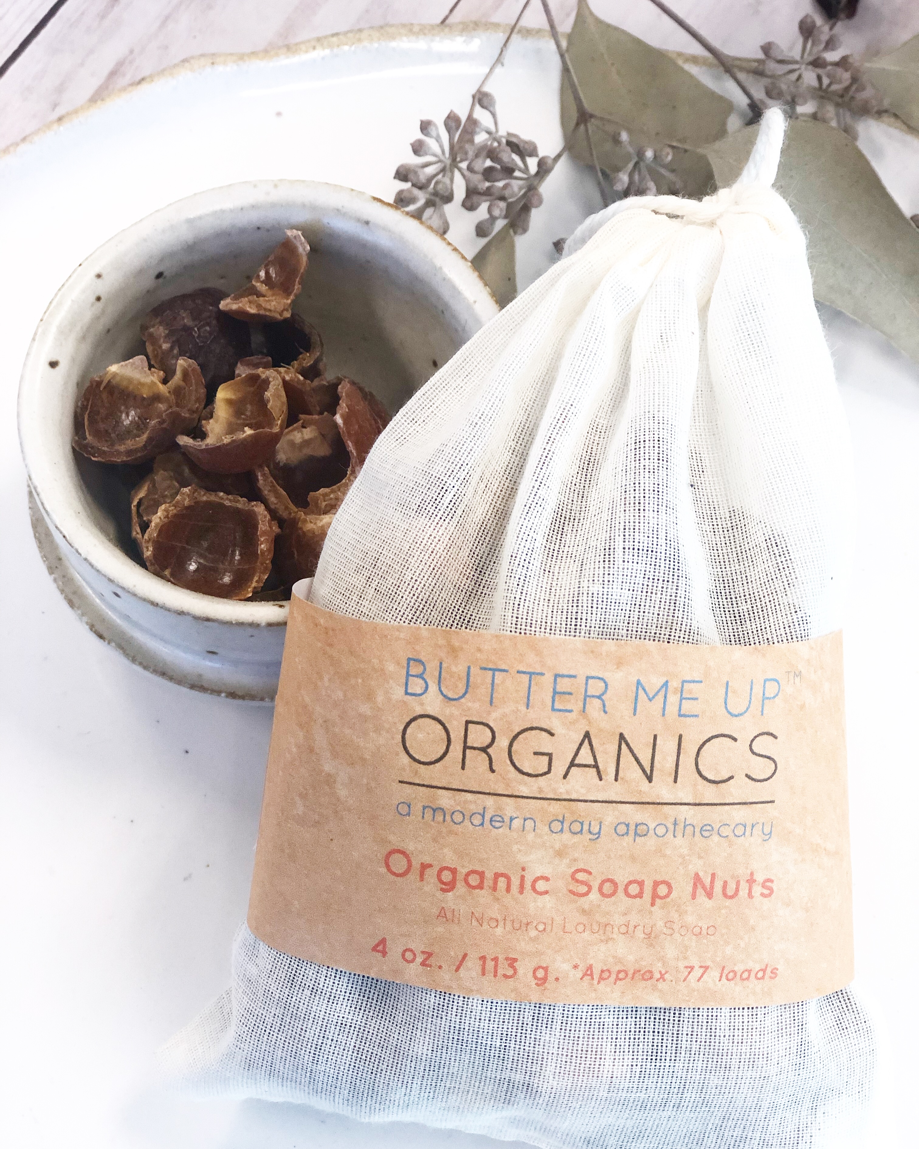 A bag of Organic Soap Nuts with muslin bag, showcasing eco-friendly laundry cleaning solution, perfect for sensitive skin and baby clothes.