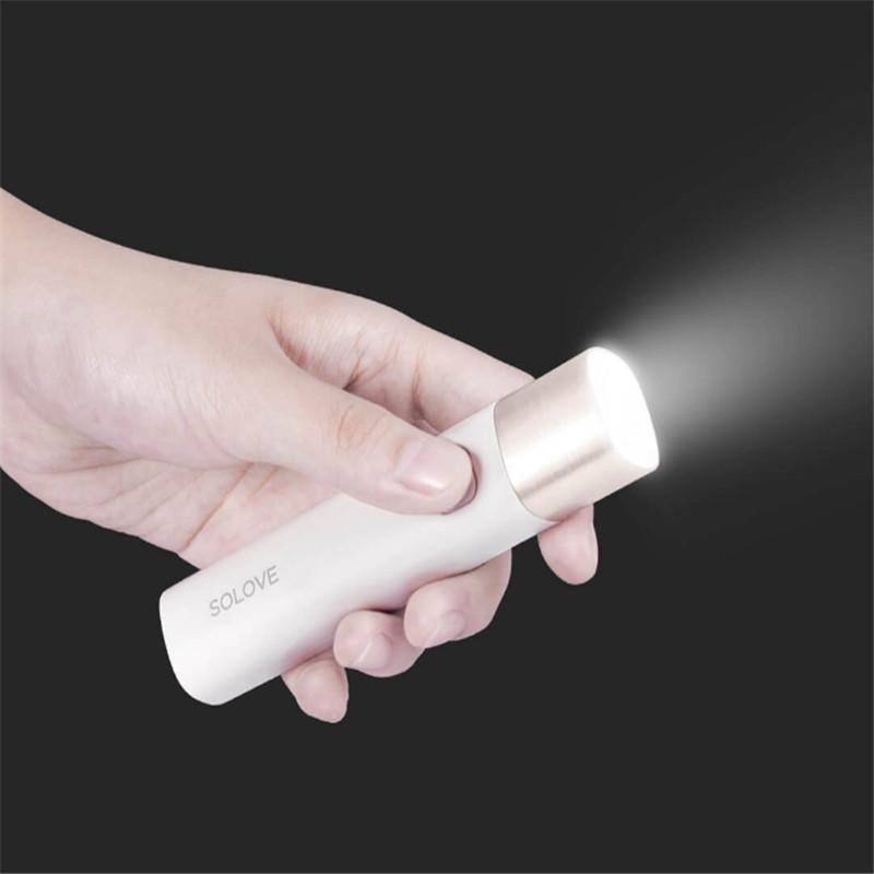 Original Xiaomi Youpin SOLOVE X3 USB Rechargeable Flashlight with power bank functionality, showcasing its sleek design and compact size.