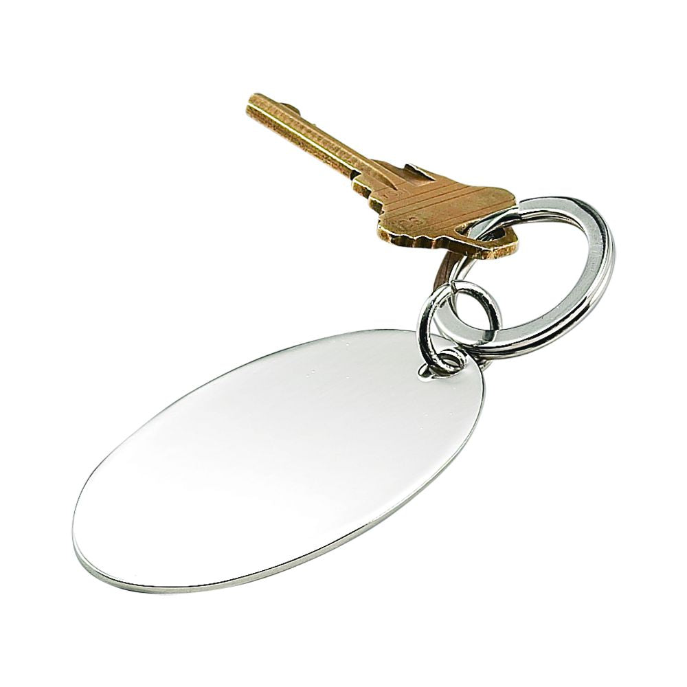 Oval shaped keychain with engraving options, presented in a green gift box.