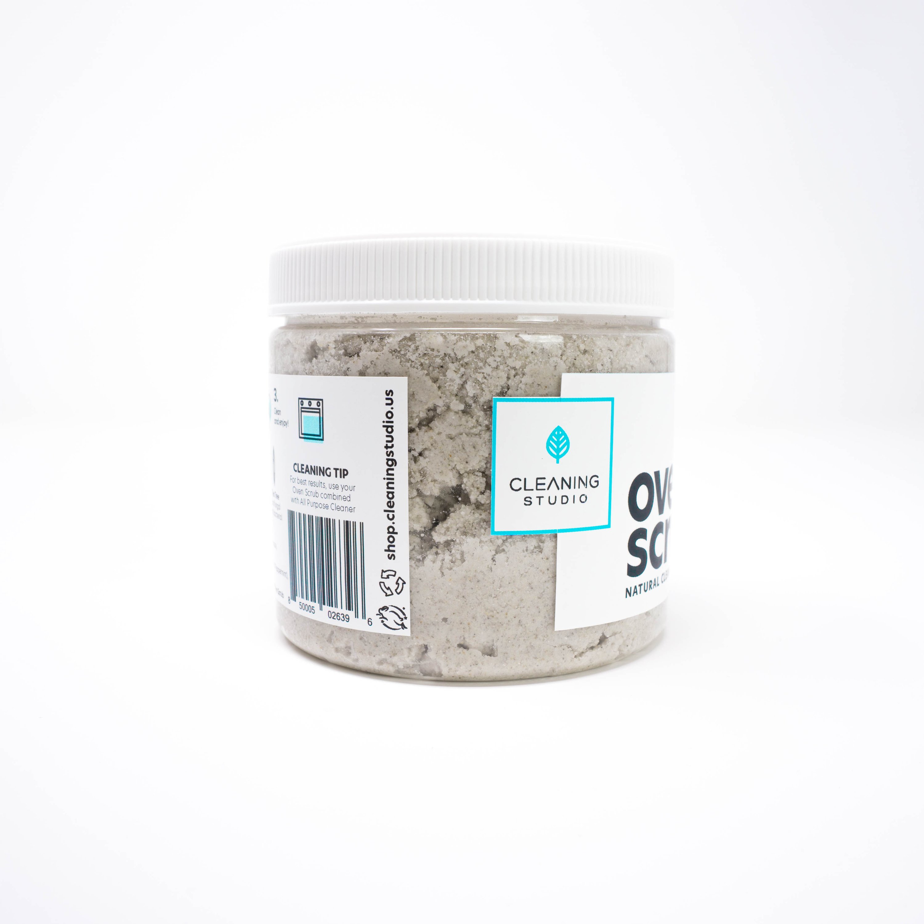 Oven Scrub Cleaner in a plastic jar with a metallic sponge, showcasing its natural ingredients and eco-friendly packaging.