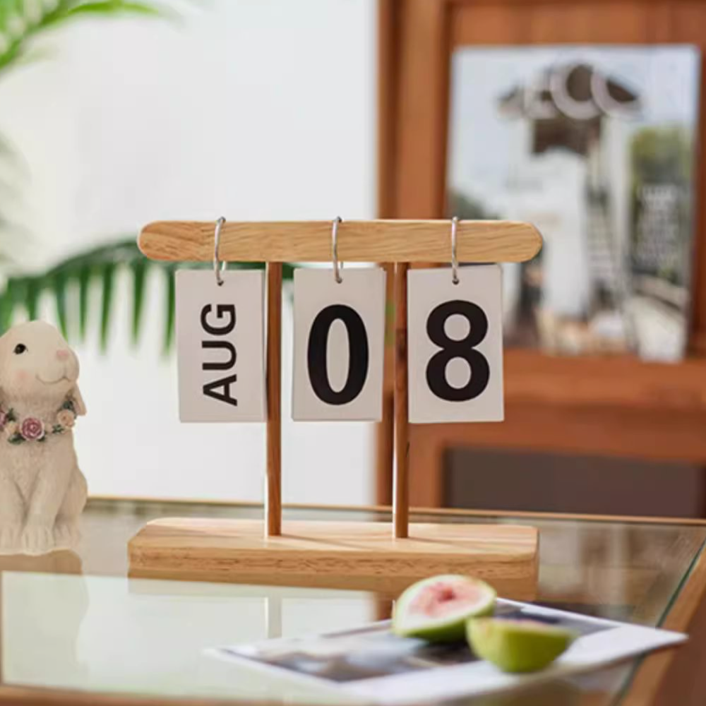 A handcrafted Page-Flipping Wooden Desktop Calendar made from rubber wood, cherry wood, and ash wood, showcasing its unique design and natural colors.