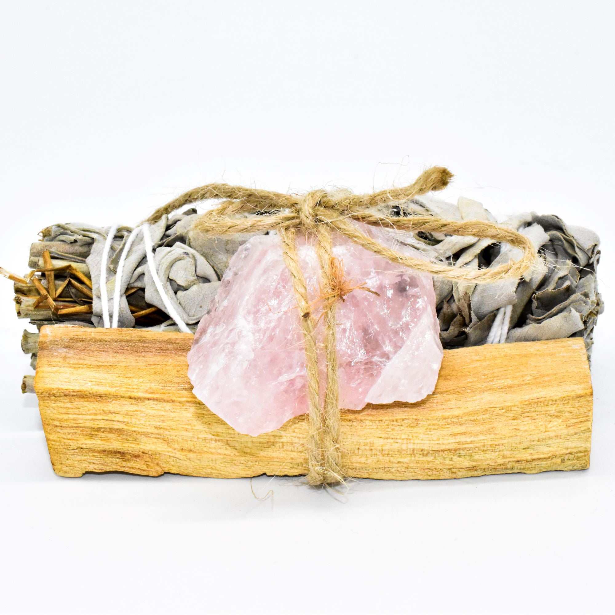 Palo Santo and Sage smudging bundle with assorted crystals, showcasing natural wood and vibrant crystal colors.