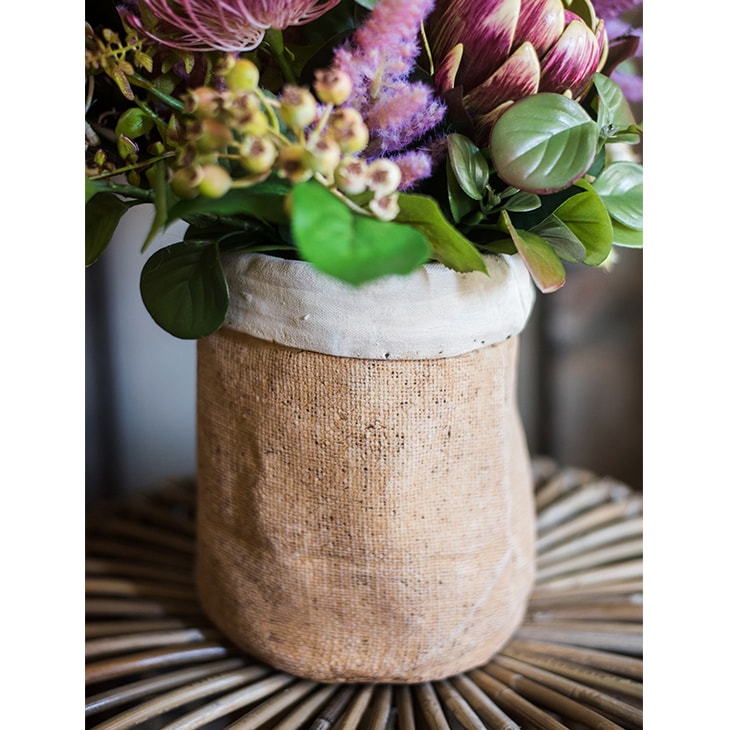 Paper Bag Style Concrete Garden Pot in khaki color, showcasing its unique design and drainage hole.