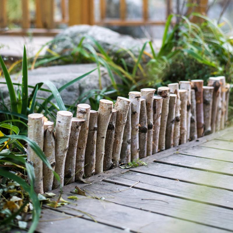 Handcrafted Paper Birch Small Wood Fence Décor, showcasing natural wood grain and khaki color, perfect for home or garden decoration.