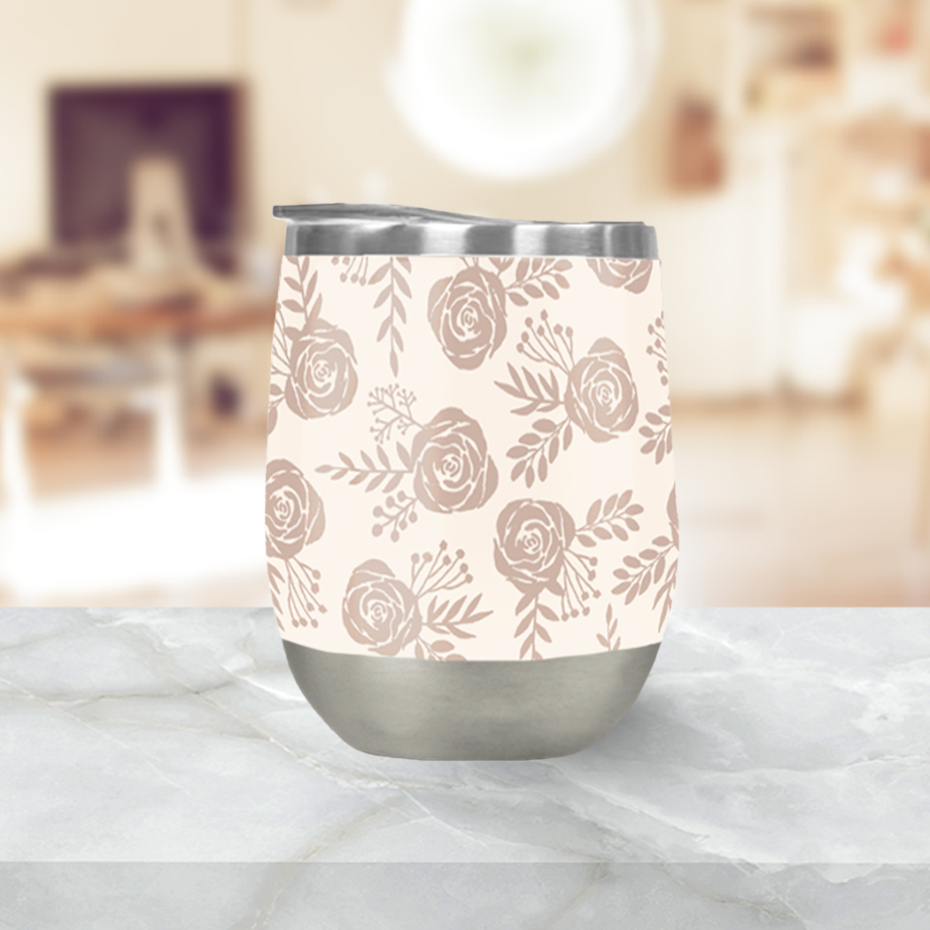 A pastel floral wine tumbler made of stainless steel, featuring a double-wall design and a plastic lid, perfect for outdoor use.