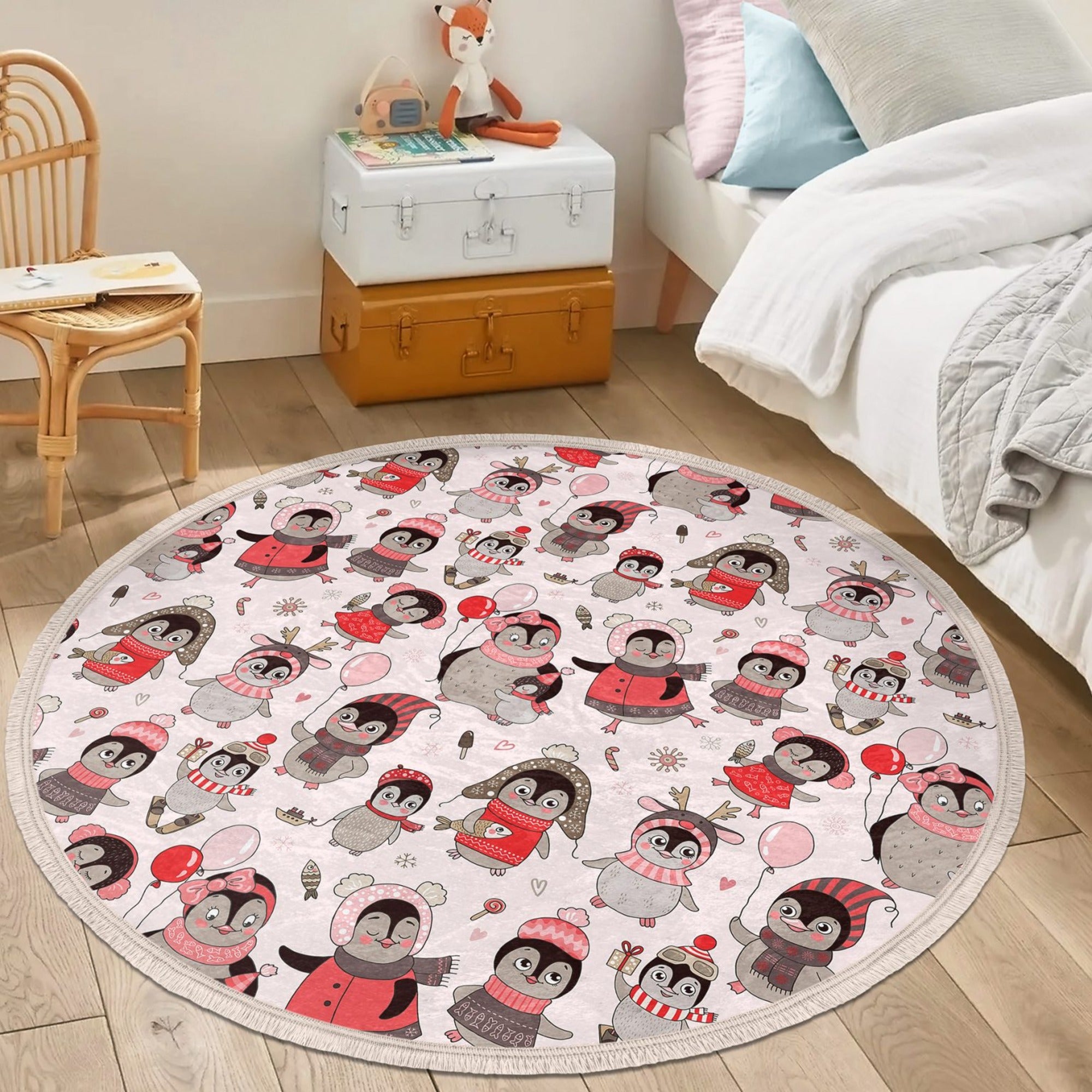 A colorful round rug featuring playful penguins, designed for kids' rooms and nurseries, made from soft velvet fabric.